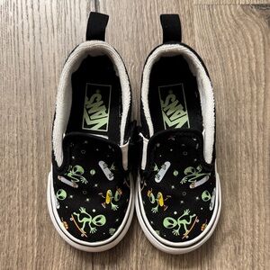 Vans Kids Black Slip-On Sneakers with Green Alien & Orange Accents
